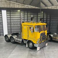 New 1:50 K100G Kenworth Chrome Yellow Black Chassis CAT Engine 